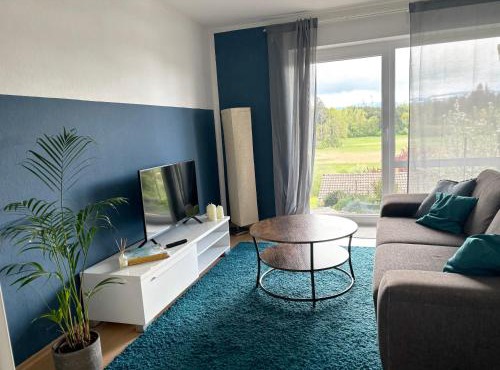 Panorama-Haus Ferienwohnung SÄNTIS - Schlafzimmer, Wohnzimmer, Küche, Bad, Sonnenterrasse mit Bergblick im Garten
