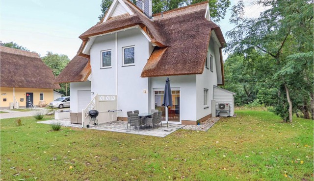 Reetdachhaus Waldidylle