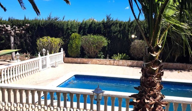 Relax in the beautiful garden located right on the harbor