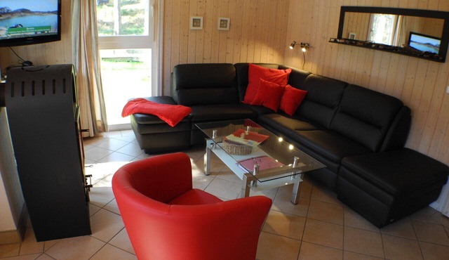 Sandburg 234 Vacation Home in Baabe. Enjoy breakfast on the sun terrace. Child-friendly amenities. A welcoming gallery with a view of the sea for those special moments of relaxation. Relaxation in the Sauna