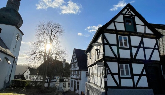 Small community center at the bell tower in the middle of the historic old town