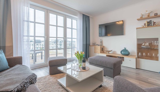 Spacious Apartment with Balcony, Limited Sea View and Parking in Börgerende