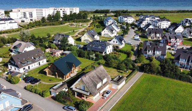 Spacious Thatched Holiday Home with Garden, Terrace and Balcony near the Beach