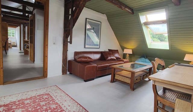 Stylish listed house. With sauna, fitness studio and a small garden. Bathing pond.