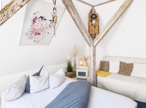 Träumen über den Dächern Wismars, Dachbodenapartment