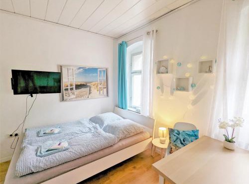 Urlaubsmagie - Ferienwohnung Tagpfauenauge - Garten mit Terrasse & Saisonaler Pool - H1