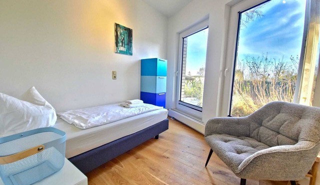 Vacation apartment 4 - Schwalbennest: comfort, dog welfare with a view of the Achterwasser