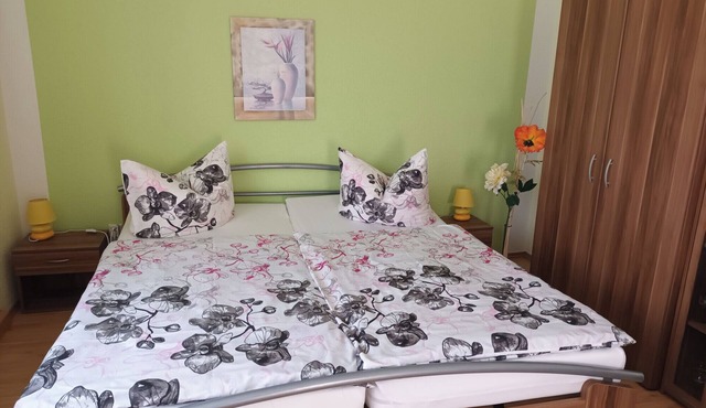 Vacation apartment with large garden area and outdoor swimming pool