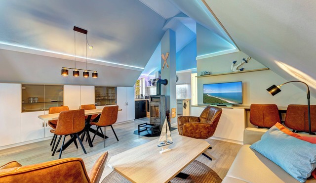 Vacation apartment with private sauna and fireplace, right on the beach.