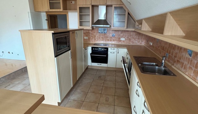 Vacation home on the top floor with air conditioning in the living & sleeping area