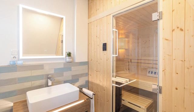 Villa Dornkamp 5 - Retreat under the roof. Sauna. Balcony. Stylish.