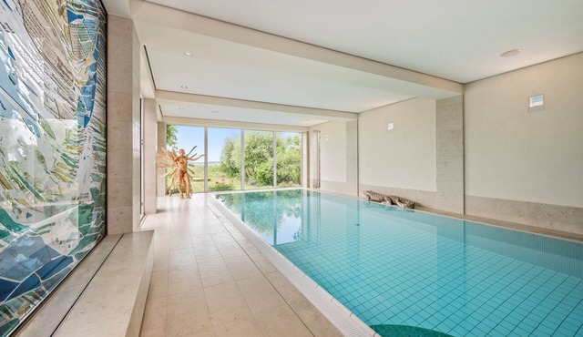 Wellness Apartment mit Pool, Sauna, Fitness und Wasserblick