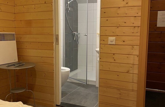 Outside : luxury modern apartment on the ground floor of a chalet, for 6-7 persons, terrace with a b