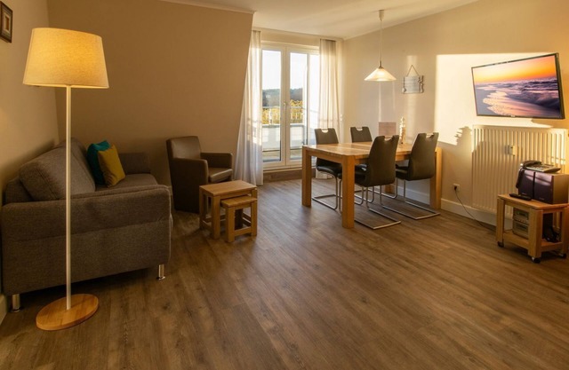 Top floor apartment with sunny balcony and beautiful view of Lake Schloon -