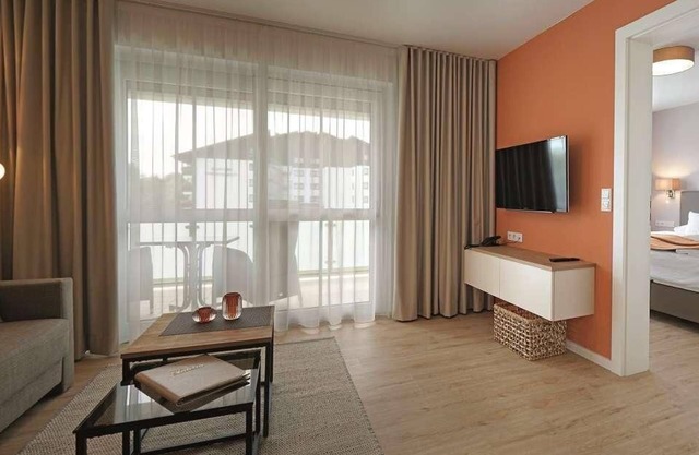 Two-room suite with large covered balcony