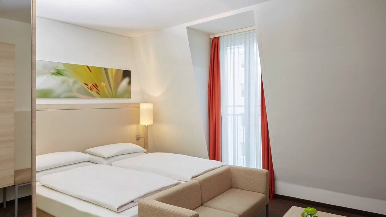 Photo of Bedroom in Ludwigsvorstadt-Kliniken