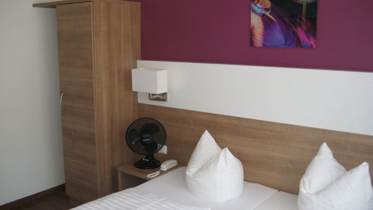 Photo of Bedroom in Ludwigsvorstadt-Kliniken