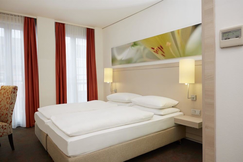 Photo of Bedroom in Ludwigsvorstadt-Kliniken