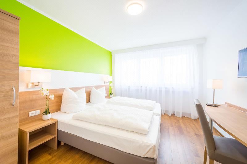 Photo of Bedroom in Ludwigsvorstadt-Kliniken