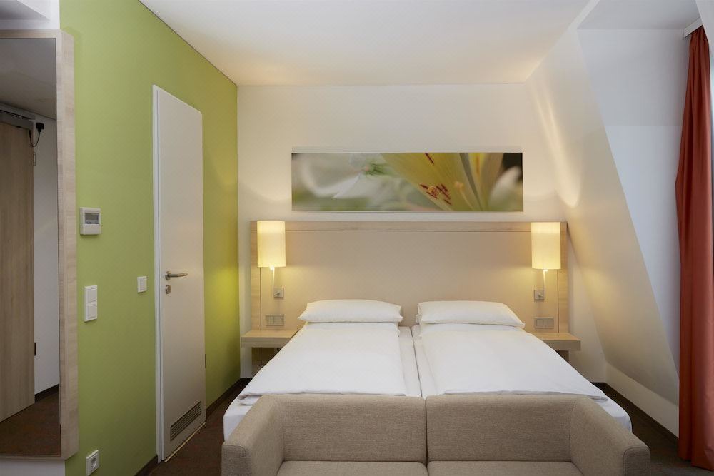 Photo of Bedroom in Ludwigsvorstadt-Kliniken