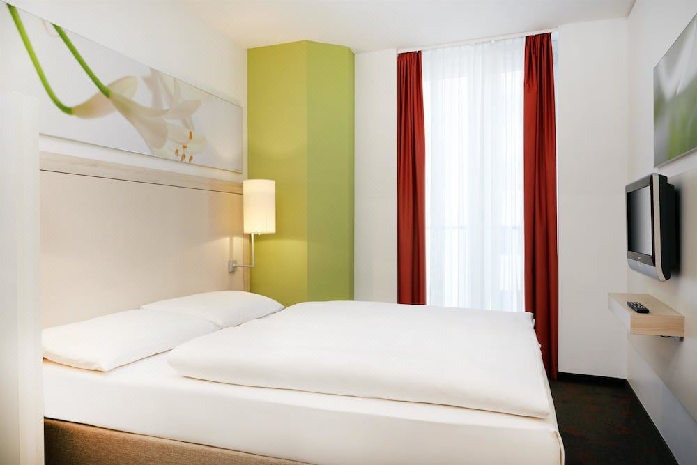 Photo of Bedroom in Ludwigsvorstadt-Kliniken