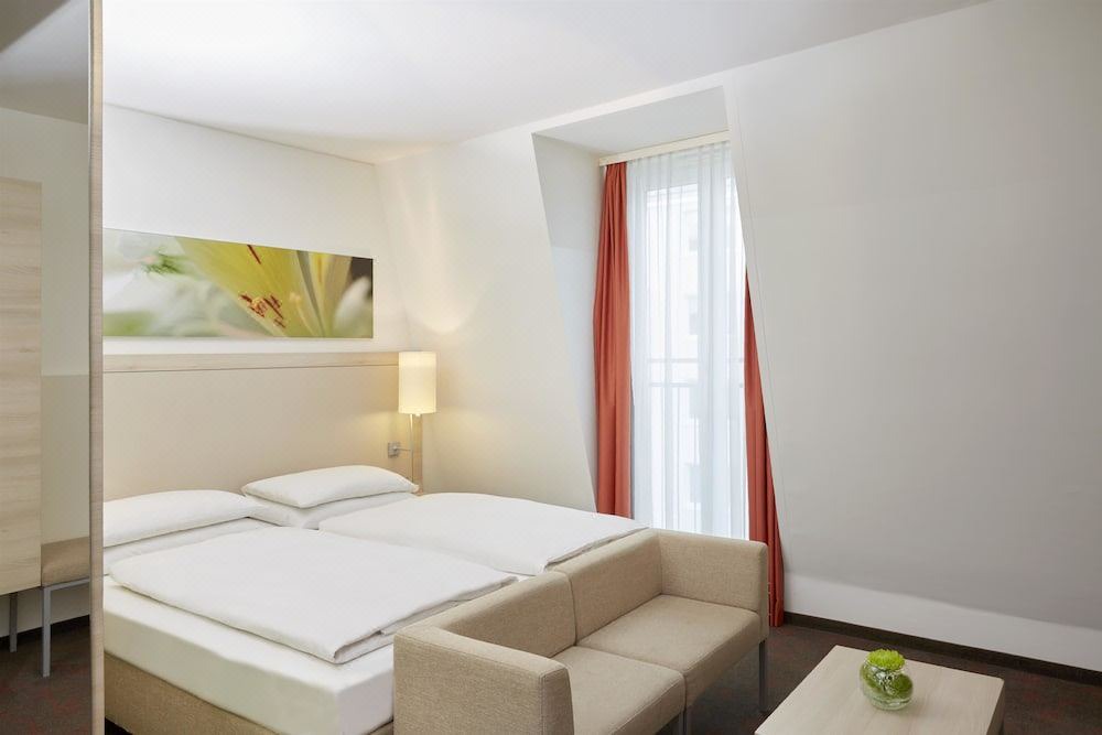 Photo of Bedroom in Ludwigsvorstadt-Kliniken