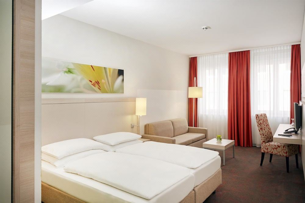 Photo of Bedroom in Ludwigsvorstadt-Kliniken