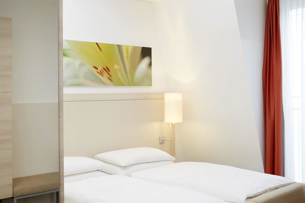 Photo of Bedroom in Ludwigsvorstadt-Kliniken