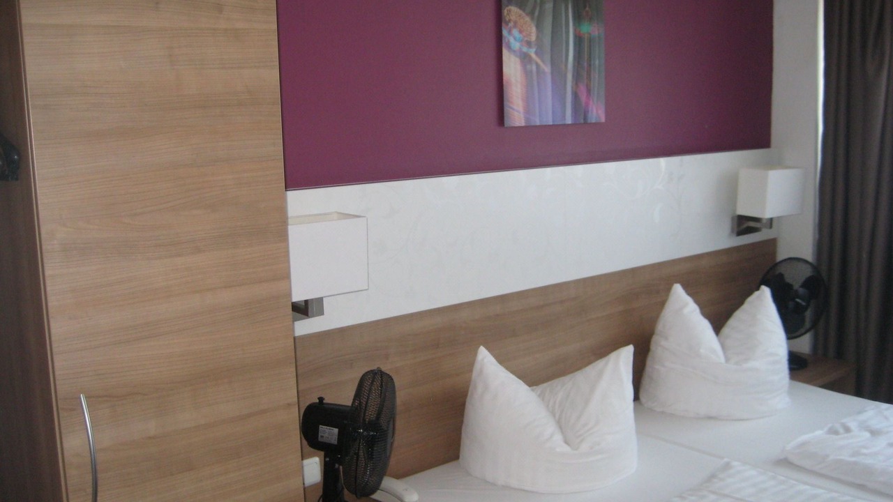 Photo of Bedroom in Ludwigsvorstadt-Kliniken
