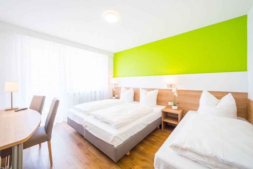 Photo of Bedroom in Ludwigsvorstadt-Kliniken