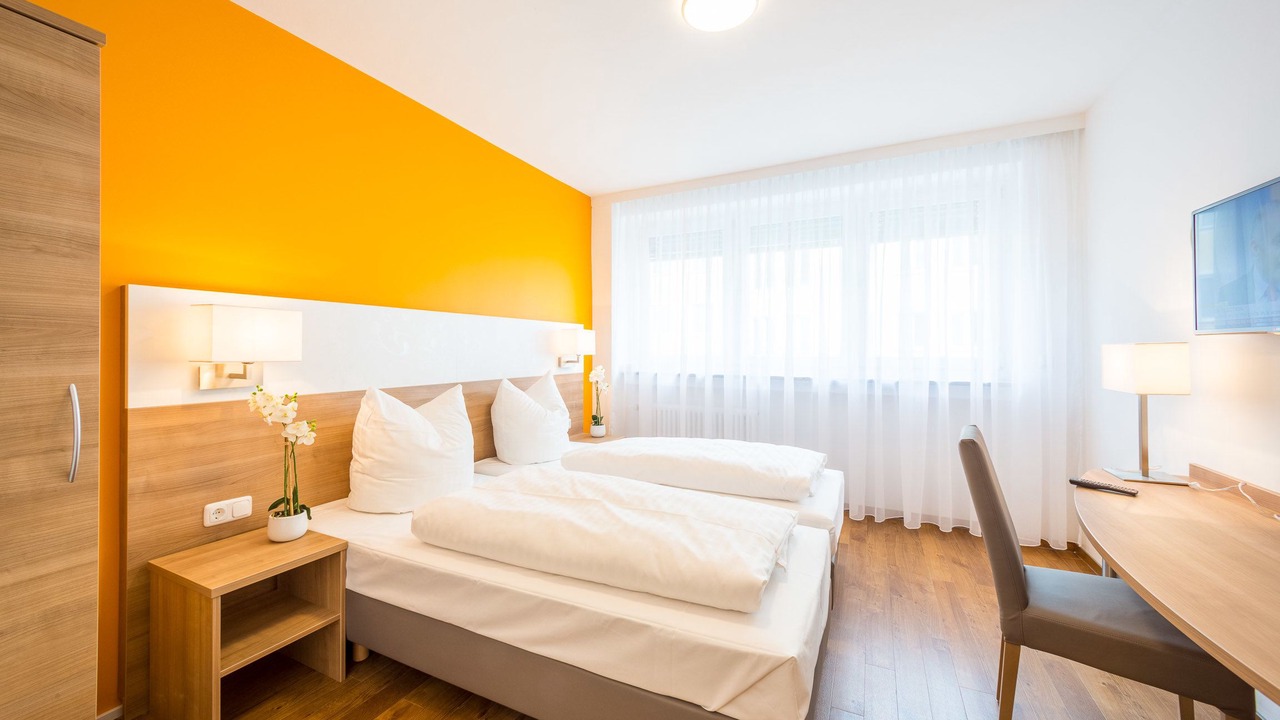 Photo of Bedroom in Ludwigsvorstadt-Kliniken