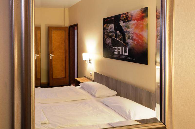Photo of Bedroom in Ludwigsvorstadt-Kliniken