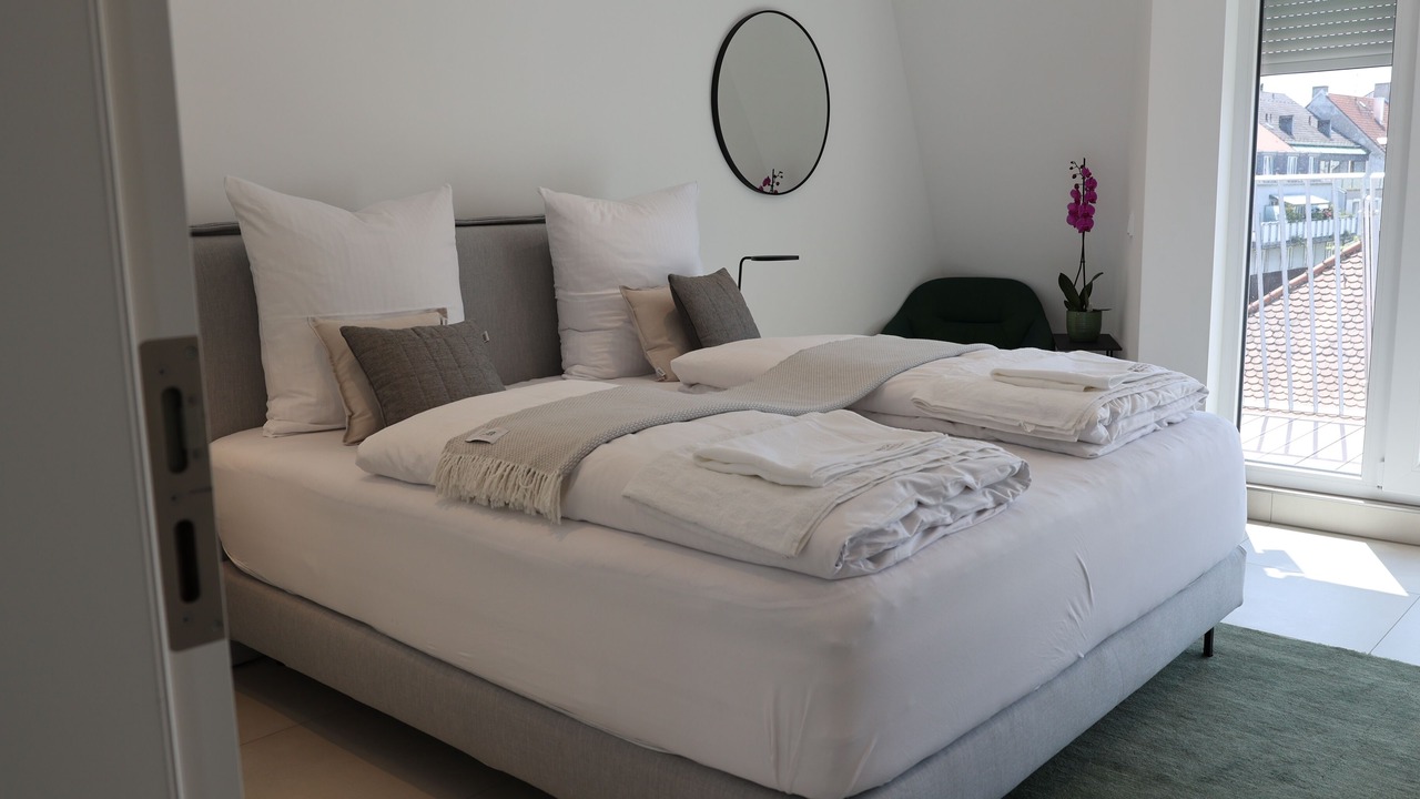 Photo of Bedroom in Ludwigsvorstadt-Kliniken