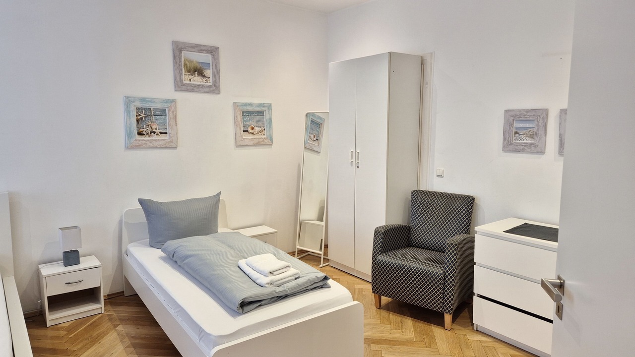 Photo of Bedroom in Ludwigsvorstadt-Kliniken
