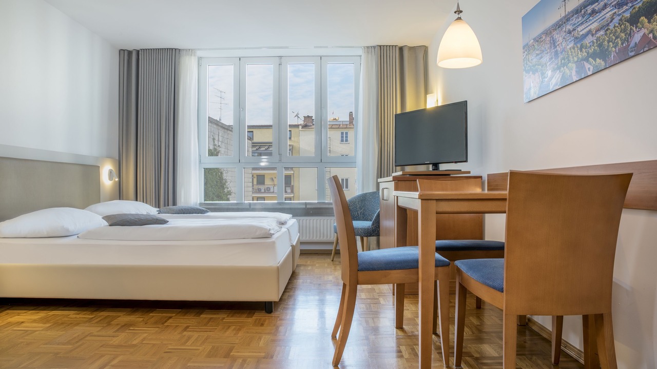 Photo of Bedroom in Ludwigsvorstadt-Kliniken