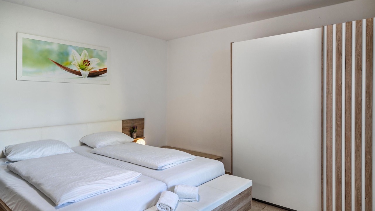 Photo of Bedroom in Ludwigsvorstadt-Kliniken