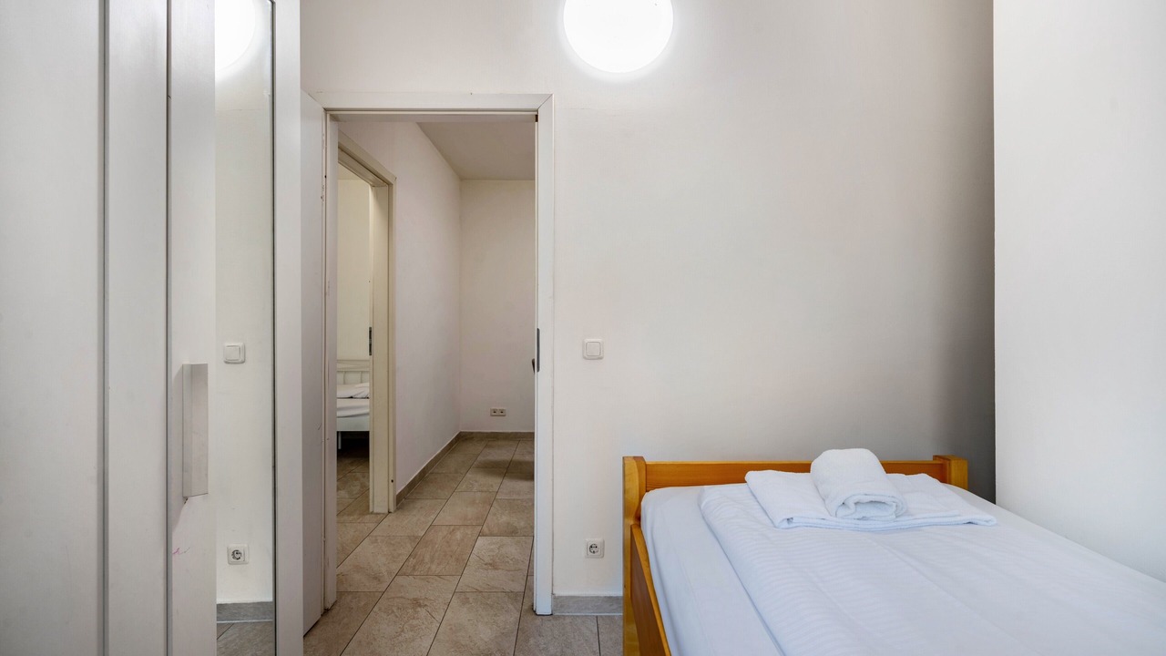Photo of Bedroom in Ludwigsvorstadt-Kliniken