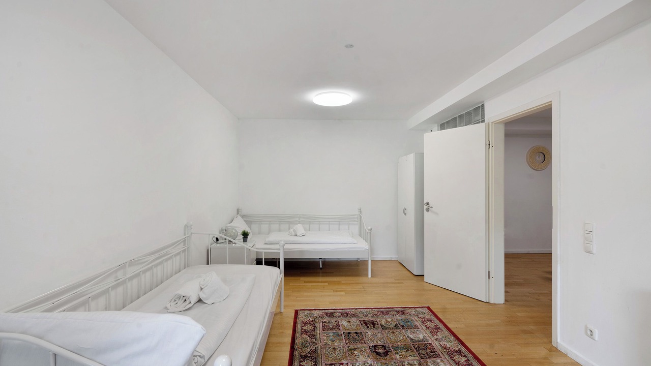 Photo of Bedroom in Ludwigsvorstadt-Kliniken