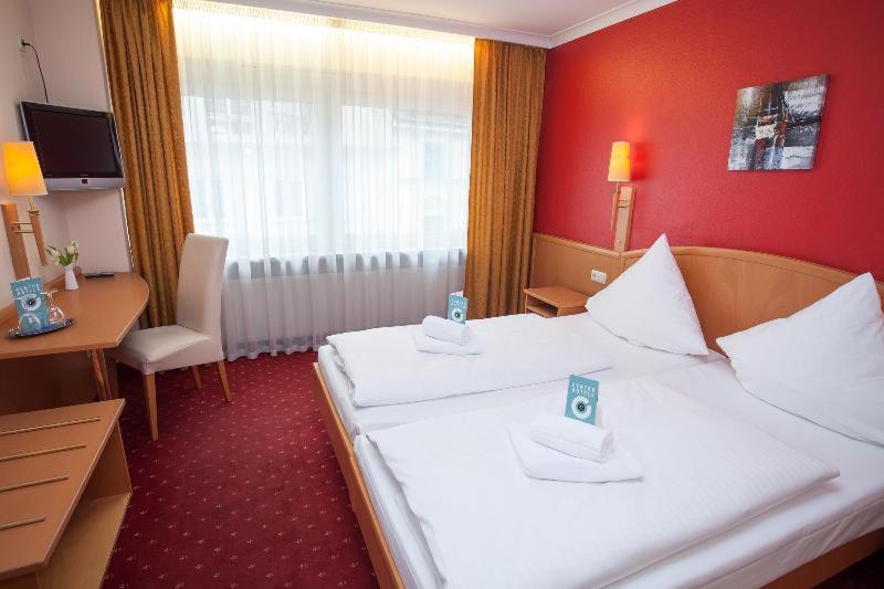 Photo of Bedroom in Ludwigsvorstadt-Kliniken