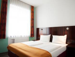 Photo of Bedroom in Ludwigsvorstadt-Kliniken