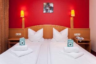 Photo of Bedroom in Ludwigsvorstadt-Kliniken
