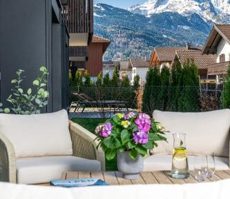 Four-Bedroom Apartment with Sauna, Garden and Mountain View