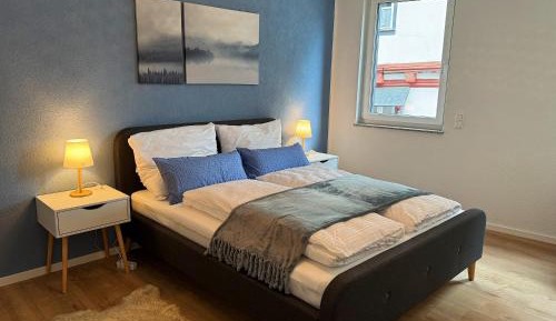 One-Bedroom Apartment with Balcony and City View