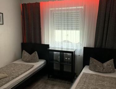 Twin Room with Shared Shower and Toilet