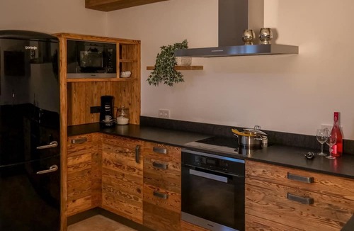 Moosen Apartment | Almhütte by Interhome