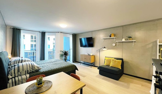 Bonquartier | Design apartment with balcony, parking space + charging station