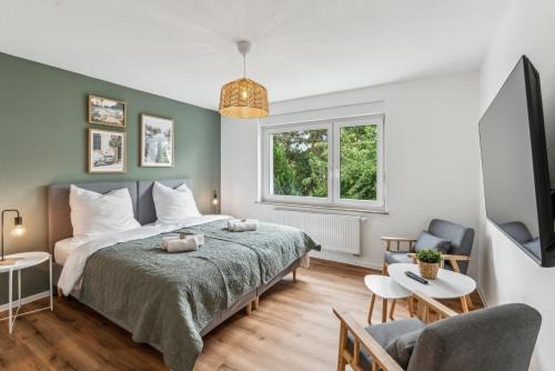 Modernes 6-Betten-Apartment mit Balkon und Parkplatz - zentrale Lage